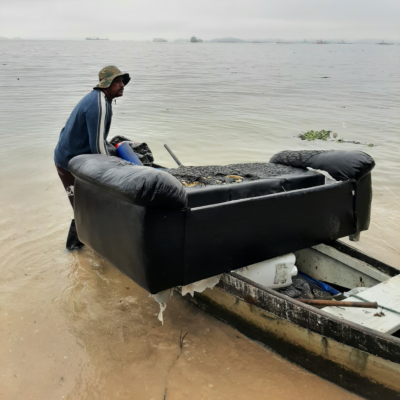 Sofas bogged down in the mangroves of Guanabara Bay; a look at Rio’s seacoast swamped with mattresses and upholstered furniture